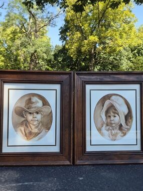 Vintage set of framed "Little Cowboy" and "Prairie Girl"